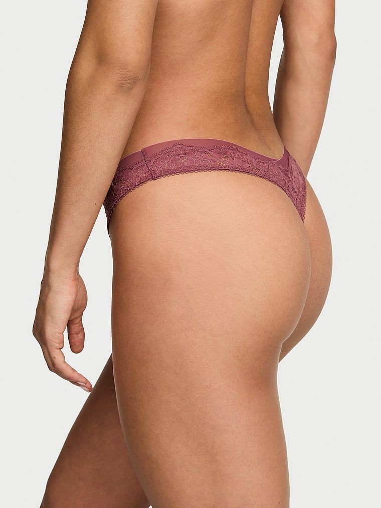 Krajková a síťová krajková tanga. Produkt je růžové barvy a pochází z kolekce Dream Angels.