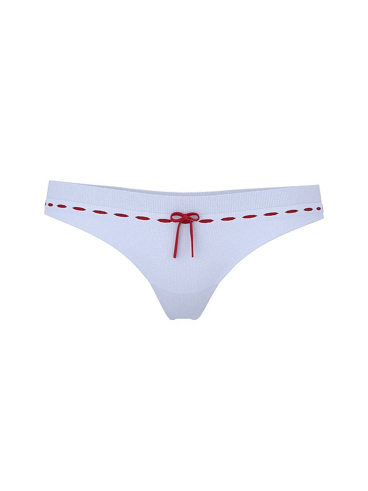 Tanga s bezšvovým otvorem na stuhu. Produkt je fialové barvy a pochází z kolekce Seamless.