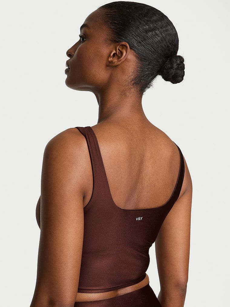 Sportovní top z vysoce lesklého materiálu VSX GlossyTech. Výrobek je hnědý a pochází z kolekce VSX.