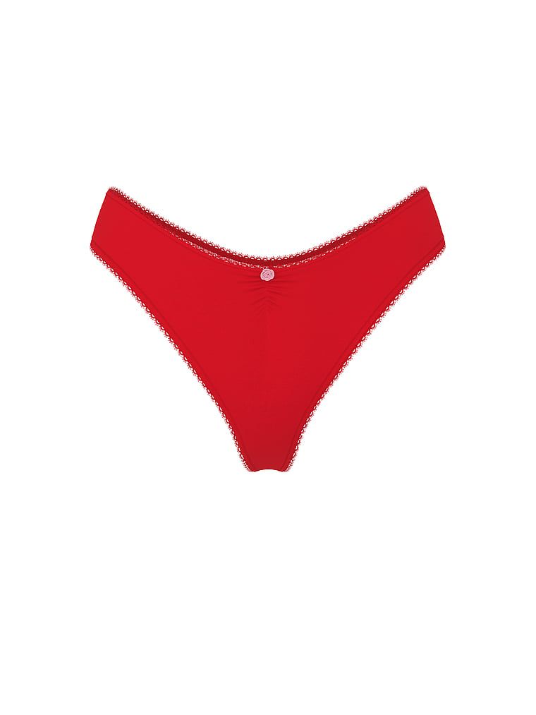 Bavlněné tanga s síťkou vzadu Heart Lace. Produkt je červené barvy a pochází z kolekce Victoria's Secret.