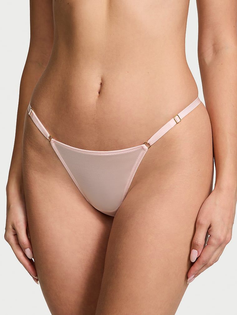 Tanga s nastavitelnými popruhy V-Hardware. Produkt je růžový a pochází z kolekce Very Sexy.