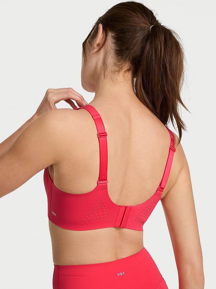 Sportovní podprsenka s maximální podporou Featherweight Max. Produkt je růžový a pochází z kolekce VSX.