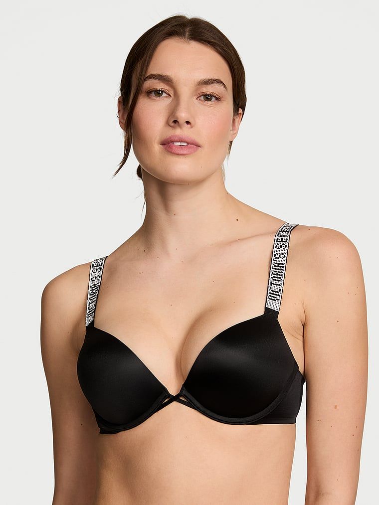 Push-up podprsenka zvětšující se o 2 velikosti Bombshell Shine Strap. Produkt je černý a pochází z kolekce Very Sexy.