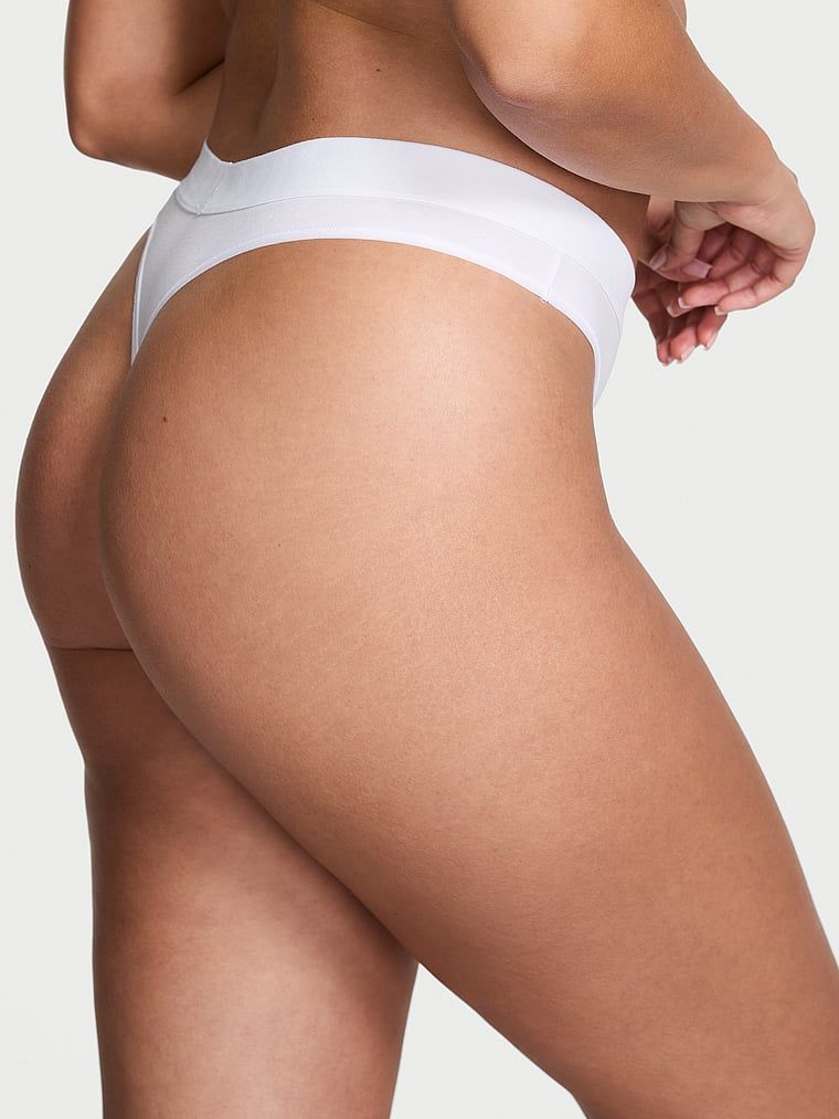 Bavlněná tanga s lesklým logem Shine Patch. Výrobek je bílé barvy a pochází z kolekce Cotton.