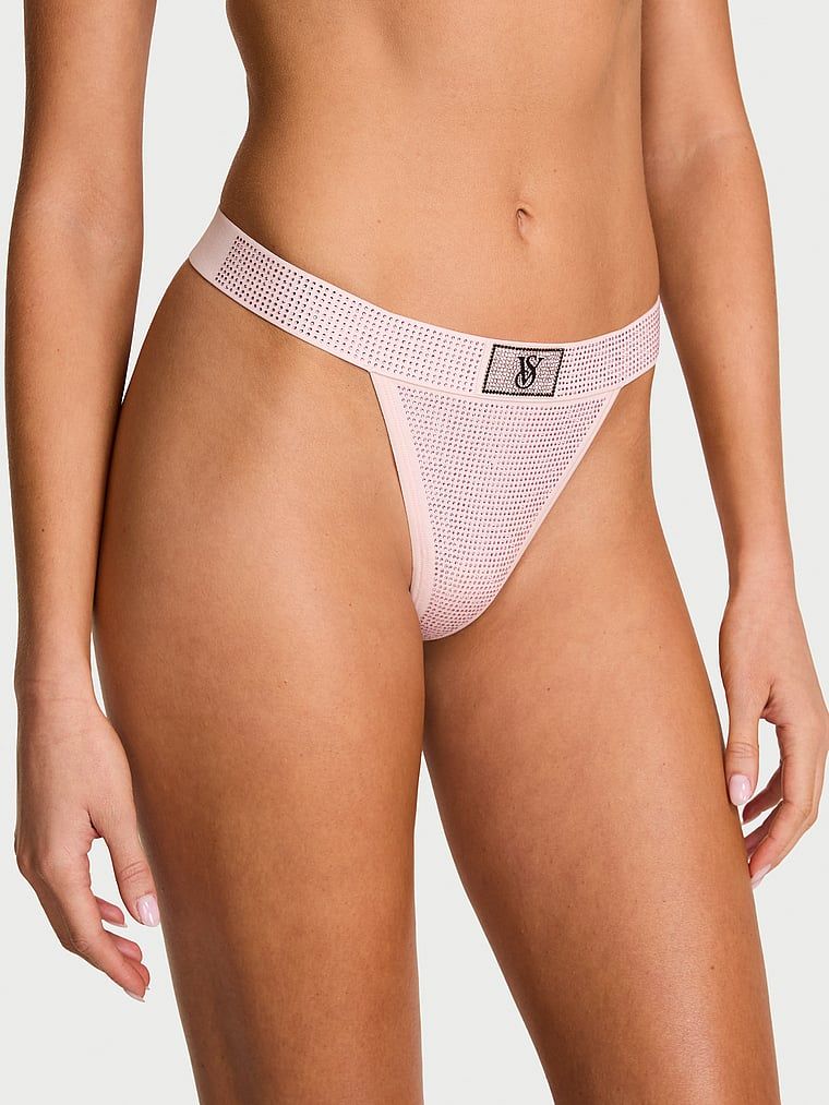 Bavlněná tanga s flitry a lesklým logem Shine. Produkt má růžovou barvu a pochází z kolekce Cotton.