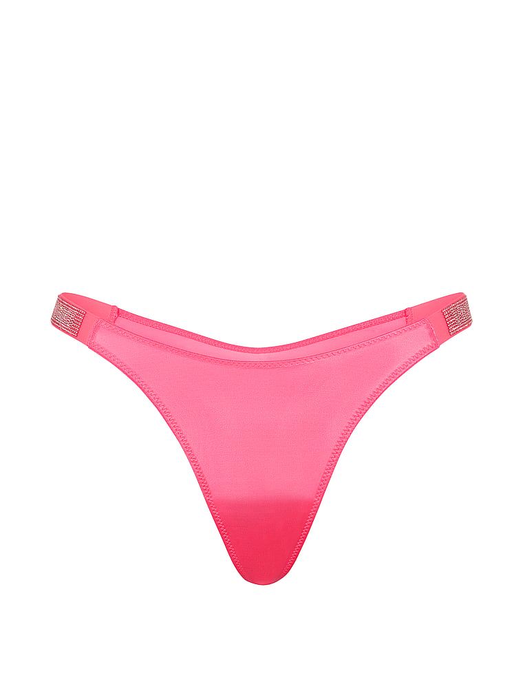 Tanga s lesklými ramínky Shine Strap. Produkt je růžové barvy a pochází z kolekce Very Sexy.