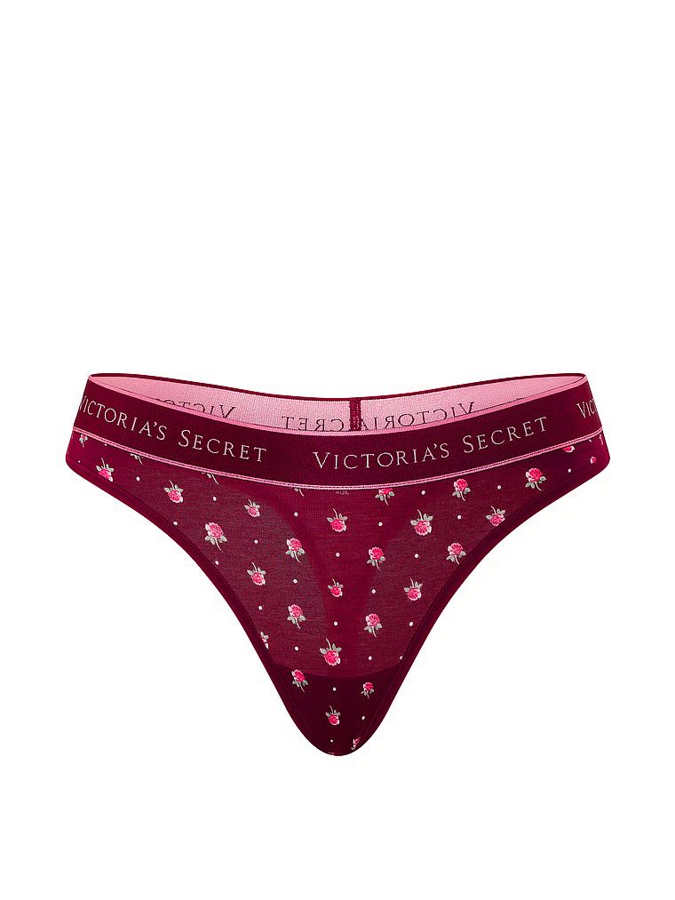 Bavlněné tanga s logem v pase. Produkt má květinovou barvu a pochází z kolekce Cotton.