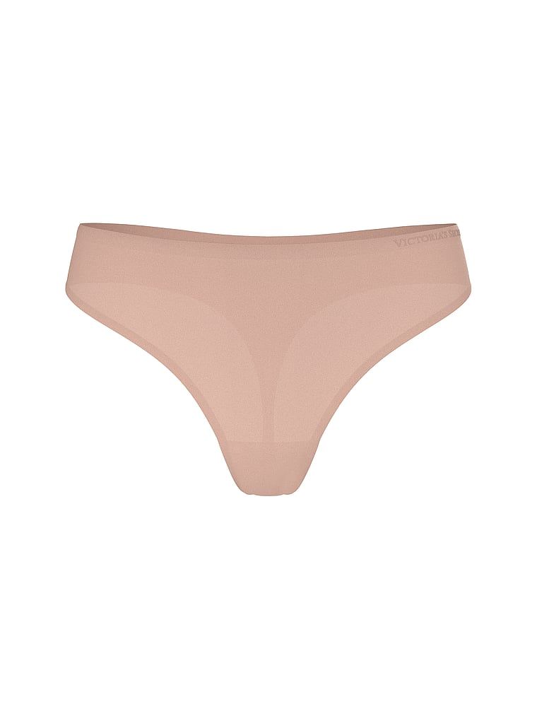 Flexibilní tanga z mikrovlákna. Produkt je béžový a pochází z kolekce Body by Victoria.