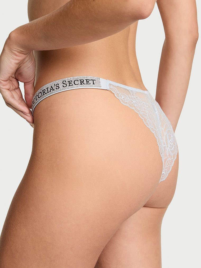 Brazilské krajkové kalhotky s brazilskými pruhy Shine Strap. Produkt je modrý a pochází z kolekce Very Sexy.