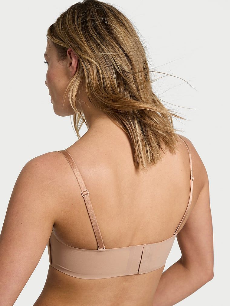 Push-up podprsenka bez ramínek a s kosticemi Perfect Comfort Strapless. Produkt je béžový a pochází z kolekce Victoria's Secret Bare.