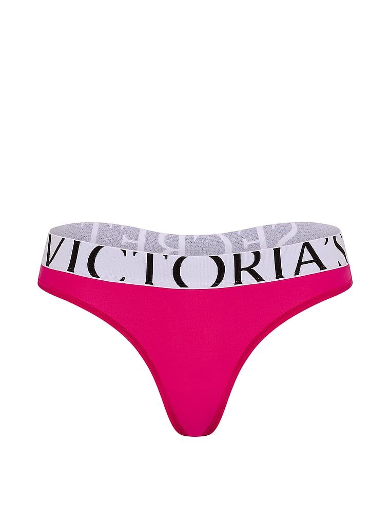 Tanga s logem Cool. Produkt je růžové barvy a pochází z kolekce Victoria's Secret.
