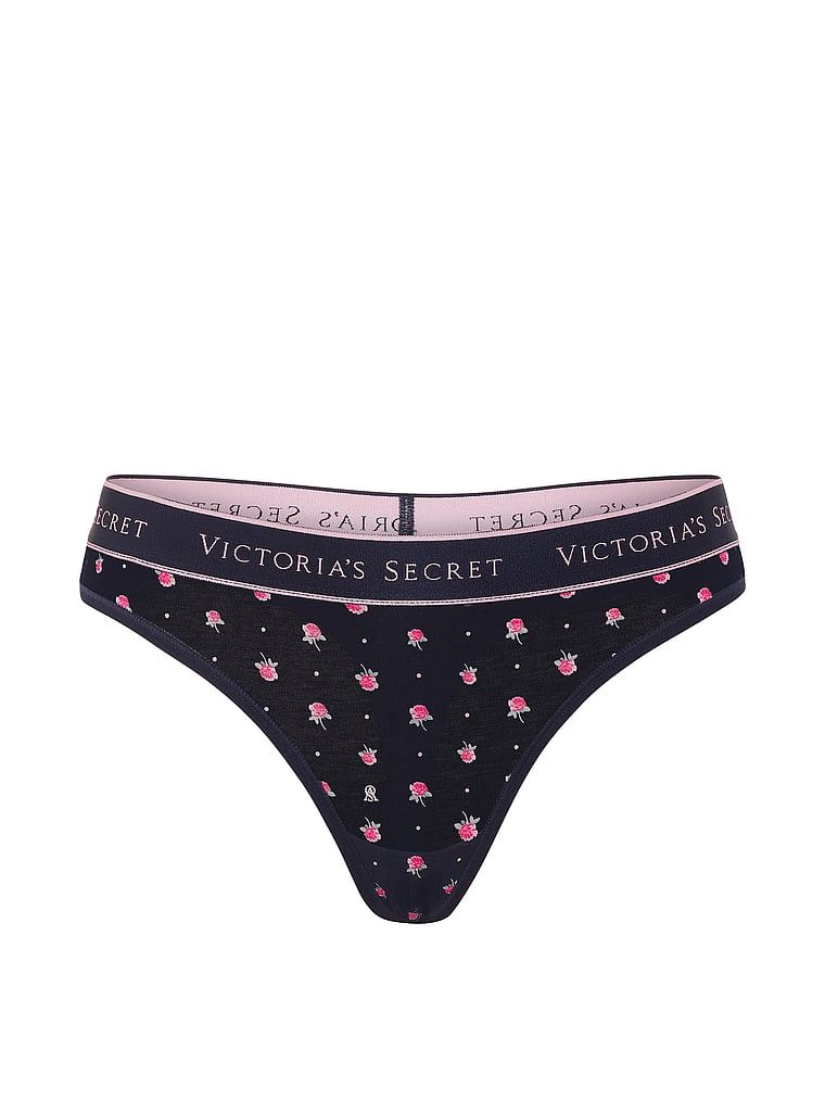 Bavlněné tanga s logem v pase. Produkt má květinovou barvu a pochází z kolekce Cotton.