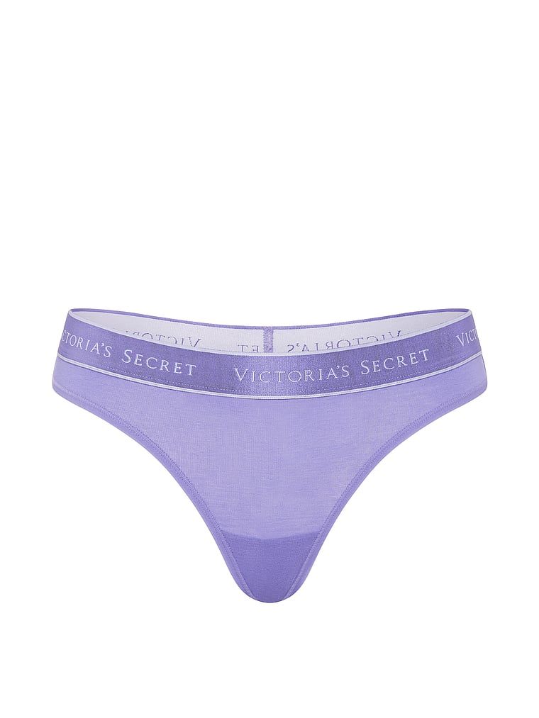 Bavlněné tanga s logem v pase. Produkt je modré barvy a pochází z kolekce Cotton.
