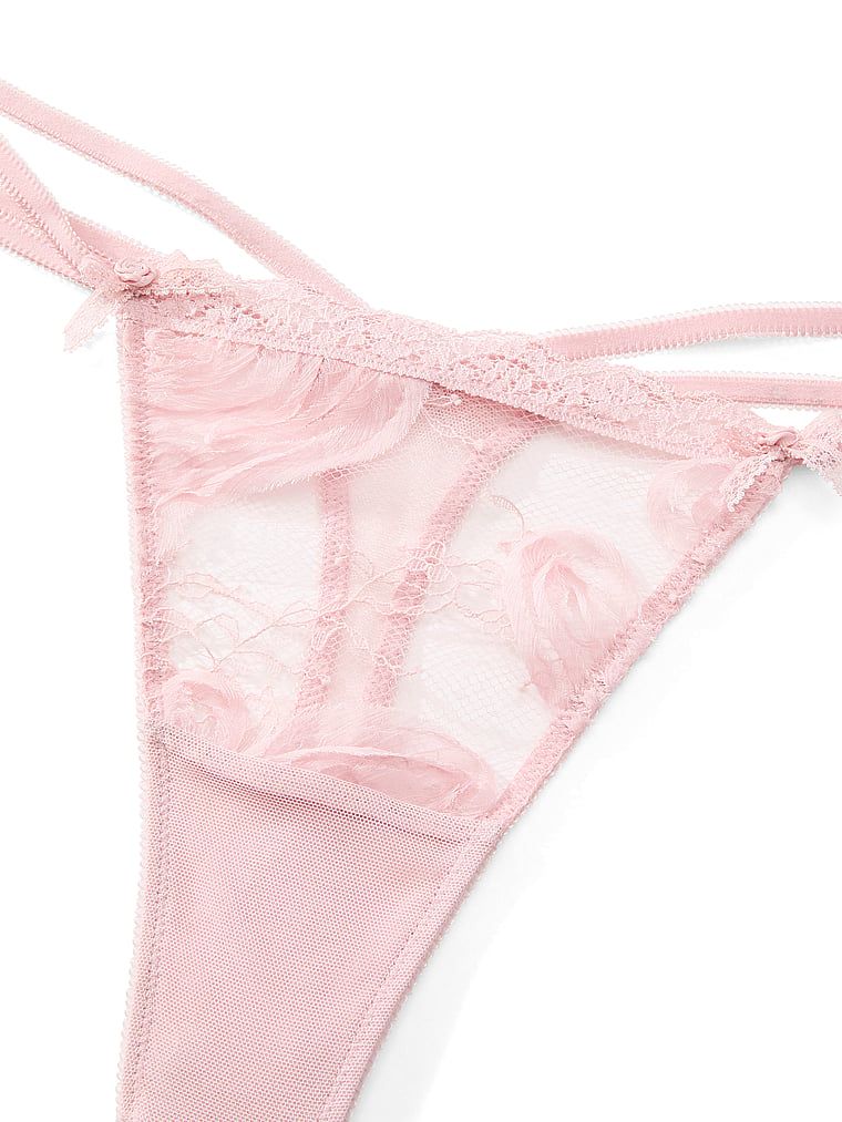 Tanga Rosette Reverie. Produkt má vzorovanou barvu a pochází z kolekce Dream Angels.