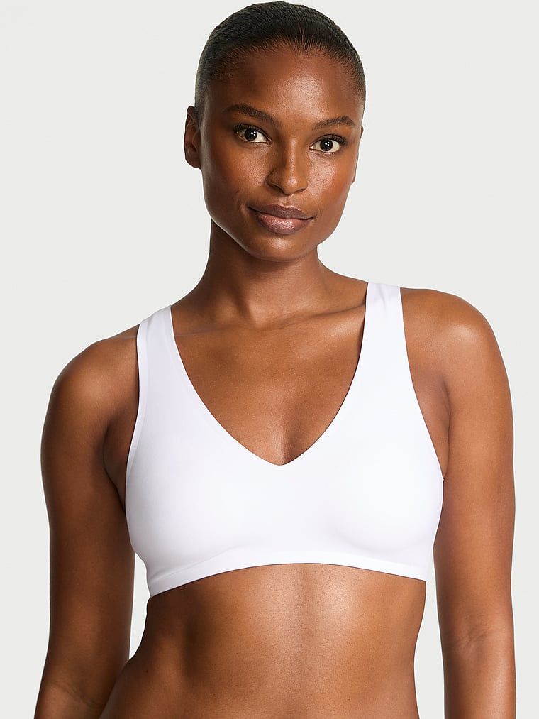 SlumberBra pro každodenní nošení i spaní. Produkt je bílý a pochází z kolekce Body by Victoria.