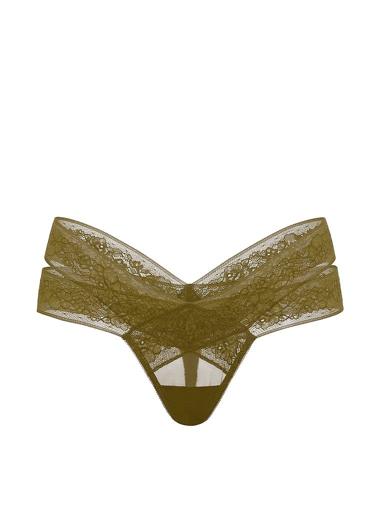 Tanga s výstřihy a krajkou s páskami. Produkt je zelené barvy a pochází z kolekce Very Sexy.