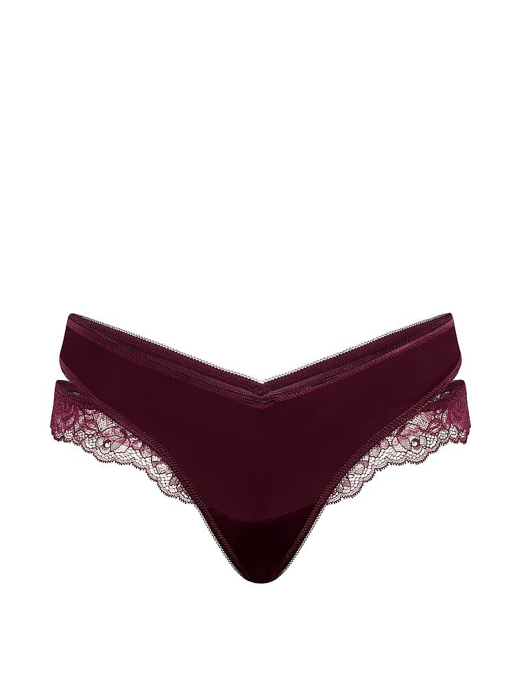 Tanga s krajkou a výstřihy po stranách. Produkt je růžové barvy a pochází z kolekce Very Sexy.