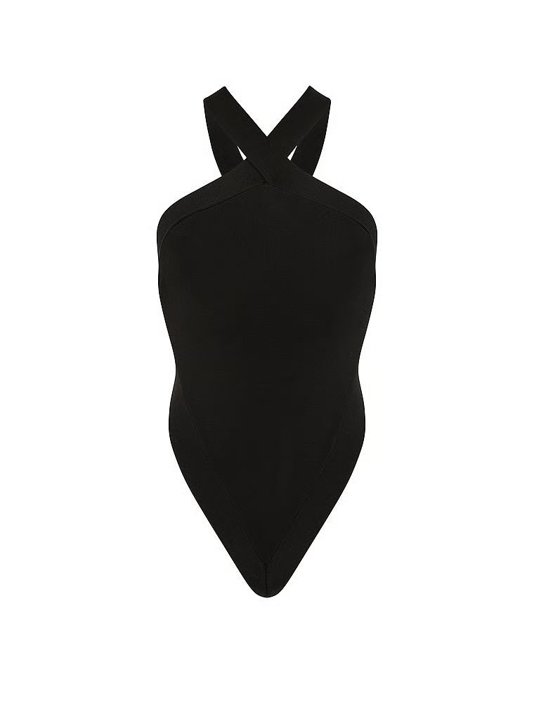 Pletený overal s otevřenými zády. Produkt je černý a pochází z kolekce Very Sexy.