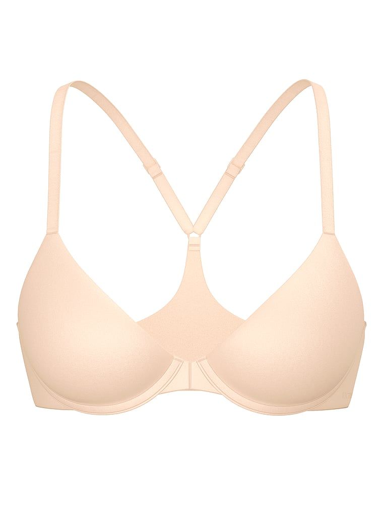 Mírně vyztužená podprsenka se zapínáním vpředu. Produkt je béžové barvy a pochází z kolekce Body by Victoria.