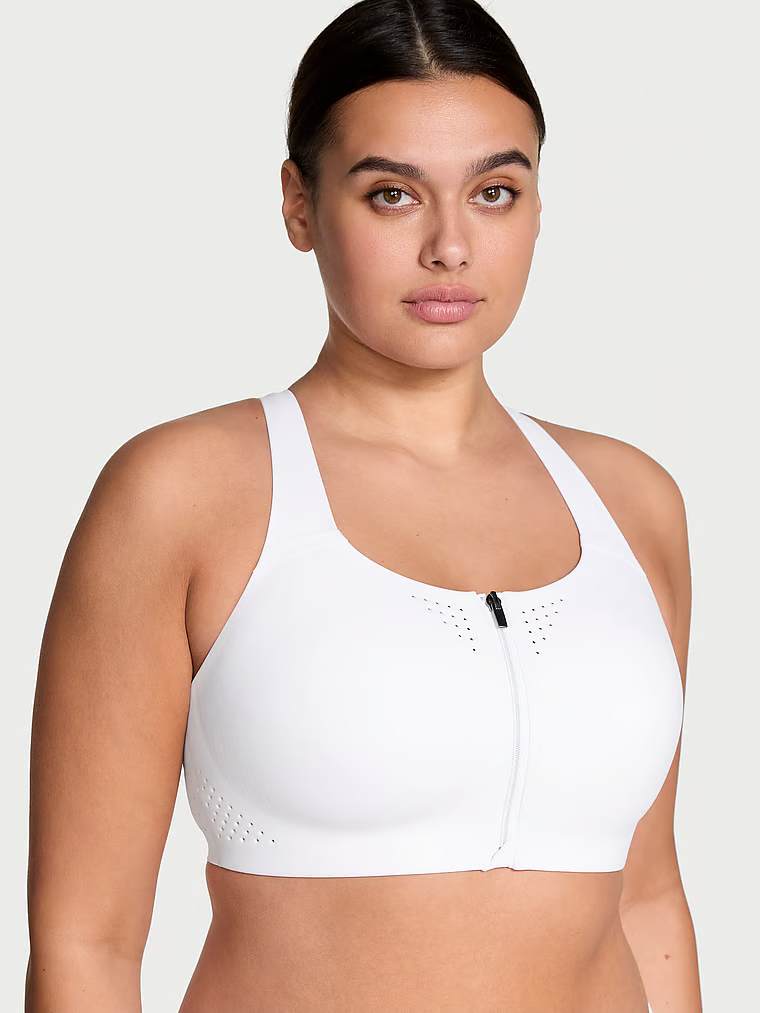 Sportovní podprsenka s maximální podporou se zipem Featherweight Max Front-Close. Produkt je bílý a pochází z kolekce VSX.