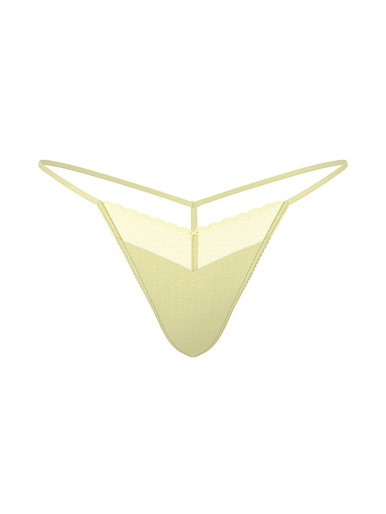 Tanga Krajka Pointelle. Produkt je žluté barvy a pochází z kolekce Victoria's Secret.