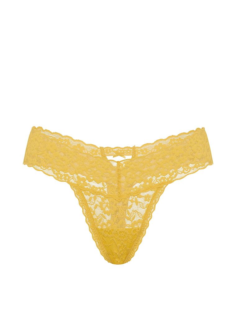 Krajkové tanga Keyhole. Produkt je žluté barvy a pochází z kolekce Lacie.