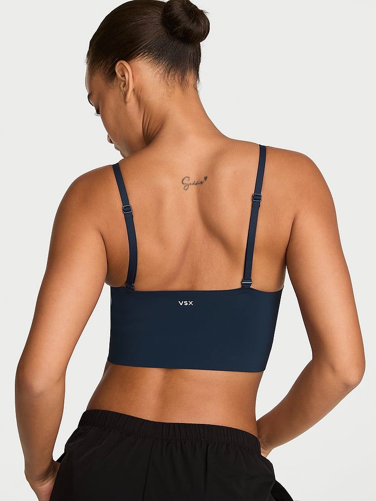 VSX Featherweight Extended Fit sportovní podprsenka. Produkt je modré barvy a pochází z kolekce VSX.