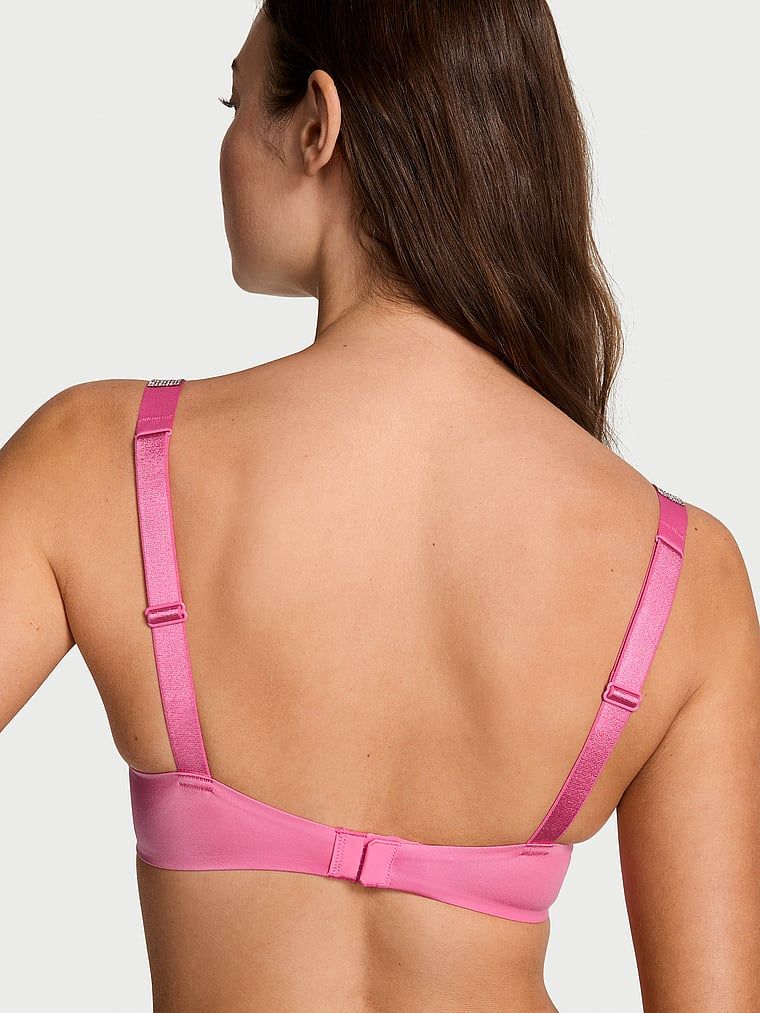Push-up zvětšující podprsenka 2 velikosti Bombshell Shine Strap. Produkt je růžové barvy a pochází z kolekce Very Sexy.
