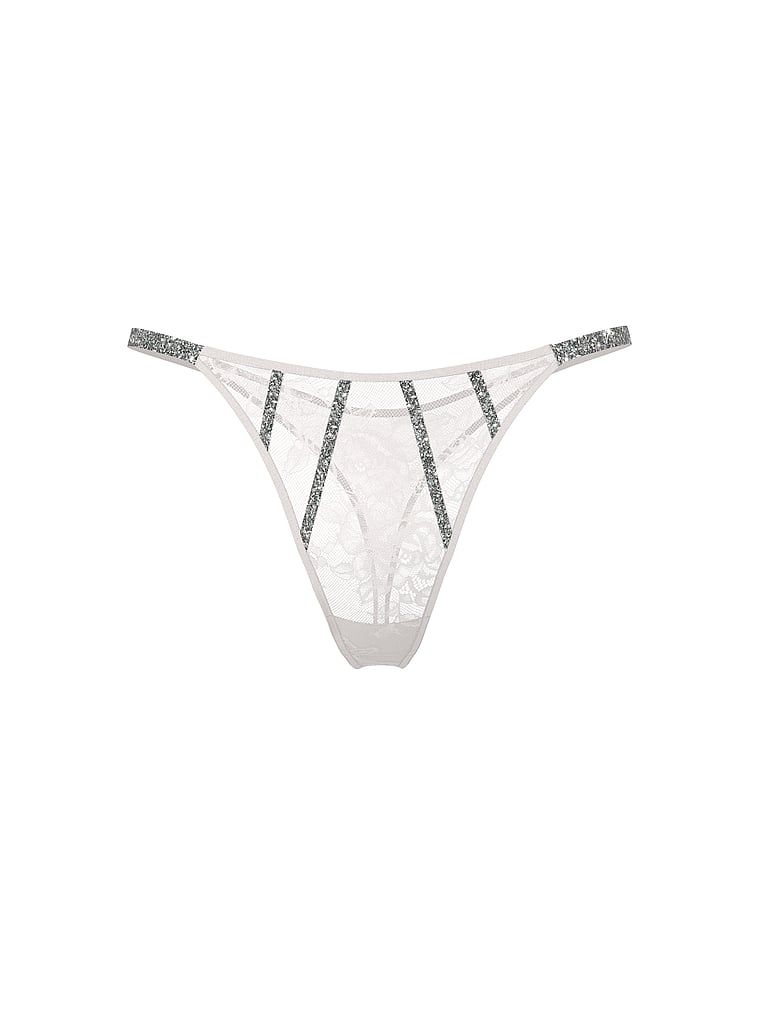 Krajkové tanga s lesklými Gradient Shine Straps. Produkt je bílé barvy a pochází z kolekce Very Sexy.