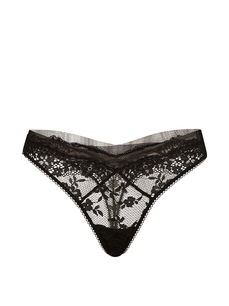 Krajková a síťová krajková tanga. Produkt je černý a pochází z kolekce Dream Angels.