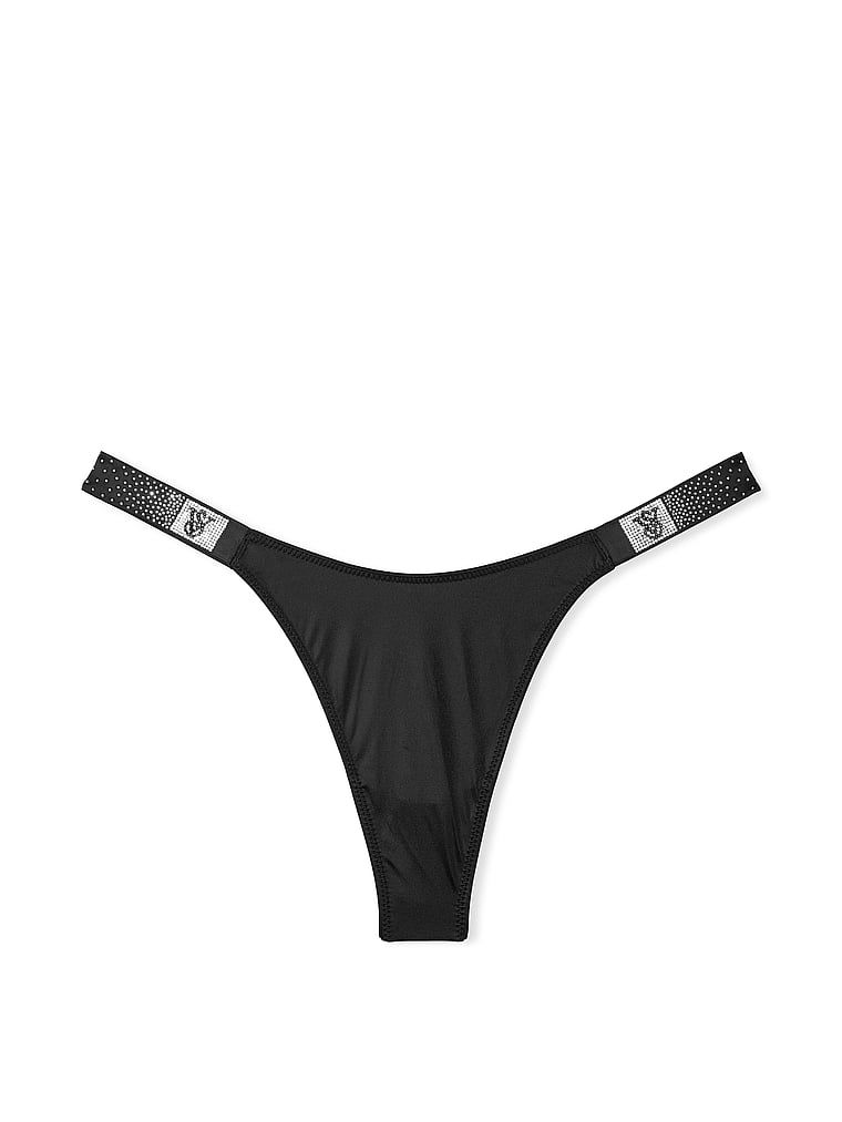 Tanga s lesklými popruhy Scattered Shine. Produkt je černý a pochází z kolekce Very Sexy.