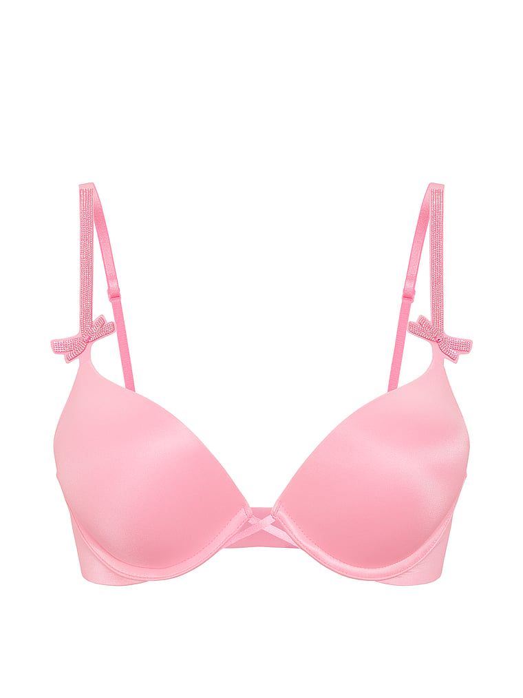 Push-up zvětšující podprsenka 2 velikosti Bombshell Shine mašle. Produkt je růžové barvy a pochází z kolekce Very Sexy.