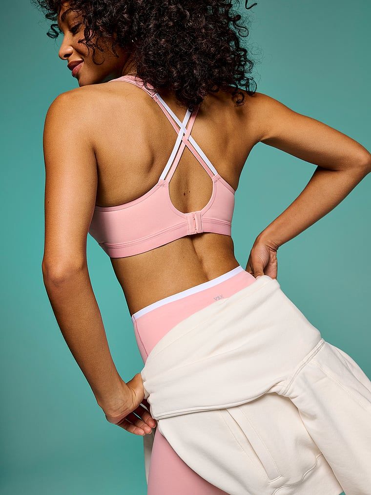 VSX Angel Elevate sportovní podprsenka. Produkt je růžové barvy a pochází z kolekce VSX.