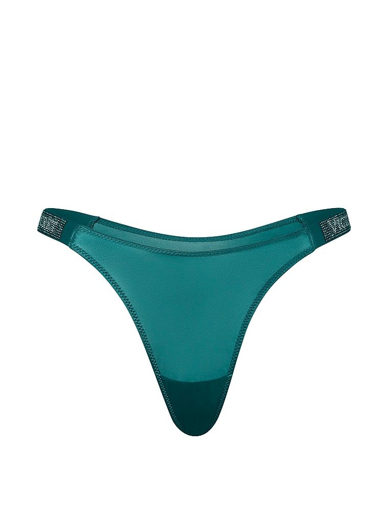 Tanga s lesklými ramínky Shine Strap. Produkt je modré barvy a pochází z kolekce Very Sexy.