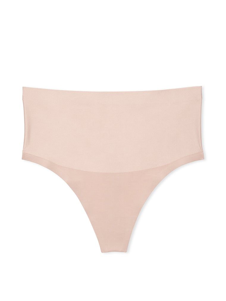 Vyhlazující tvarující tanga s vysokým pasem. Produkt je béžový a pochází z kolekce Body by Victoria.