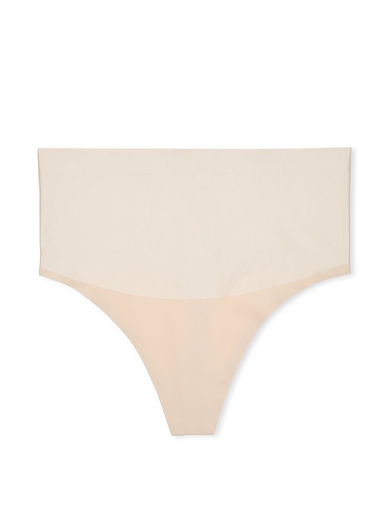 Vyhlazující tvarující tanga s vysokým pasem. Produkt je béžový a pochází z kolekce Body by Victoria.