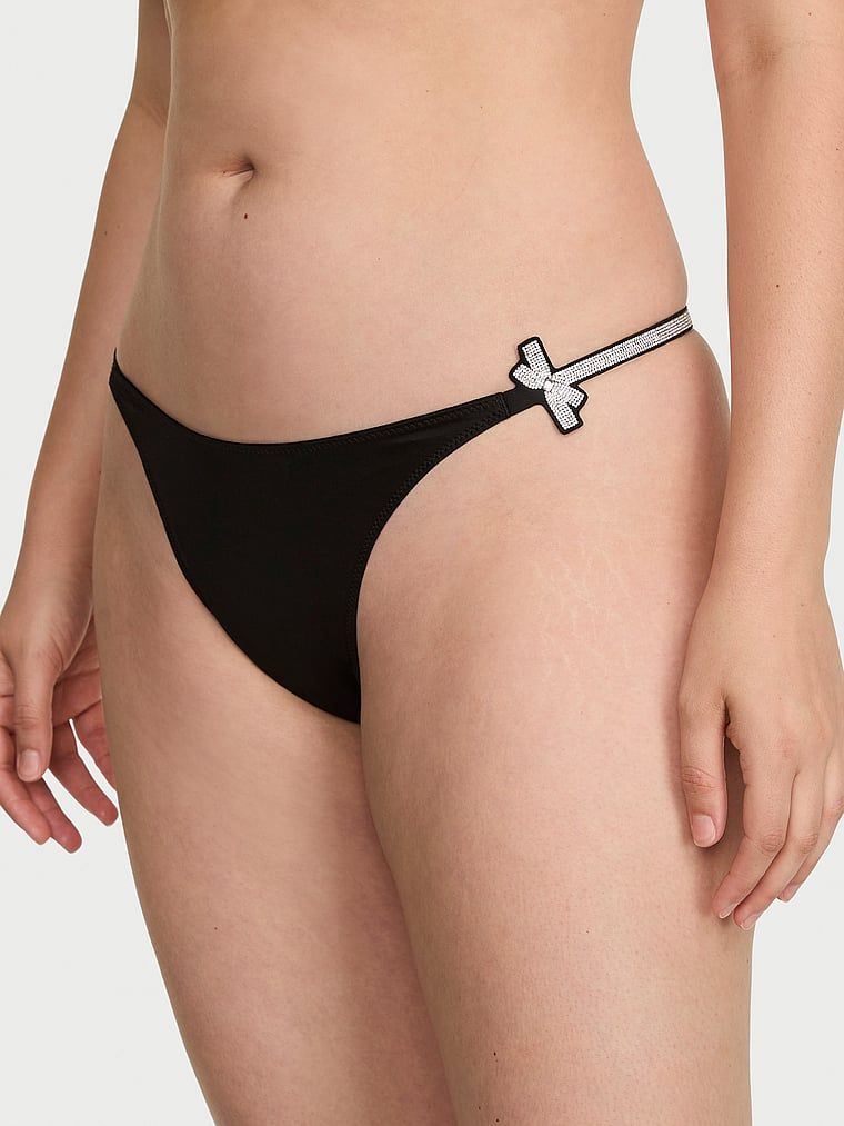 Tangový lesk mašle. Produkt je černý a pochází z kolekce Very Sexy.