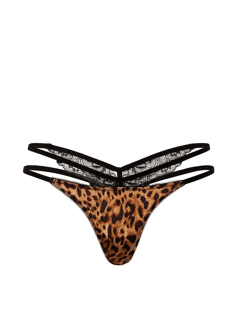 Tanga s krajkou a výstřihy po stranách. Produkt má vzorovanou barvu a pochází z kolekce Very Sexy.