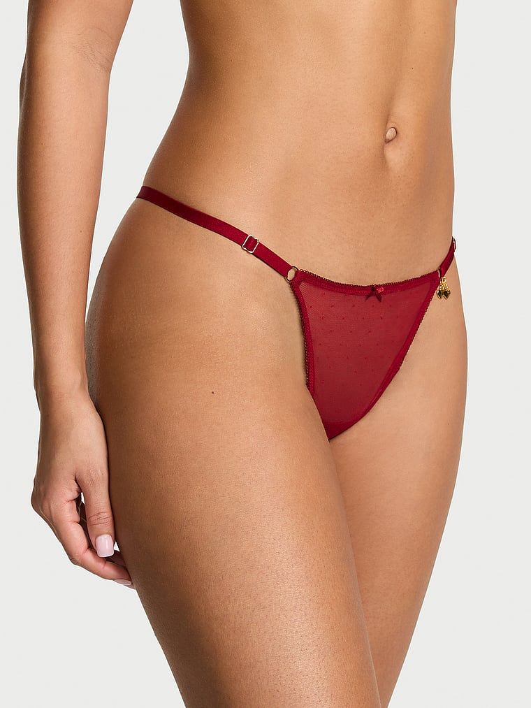 Tanga s nastavitelnými popruhy Tease Cherry Hardware. Produkt je červené barvy a pochází z kolekce Very Sexy.