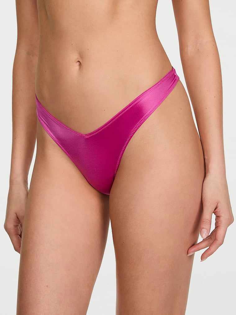 Tanga s ramínky vzadu a vysoko střiženými rameny na zádech. Produkt je růžové barvy a pochází z kolekce Very Sexy.