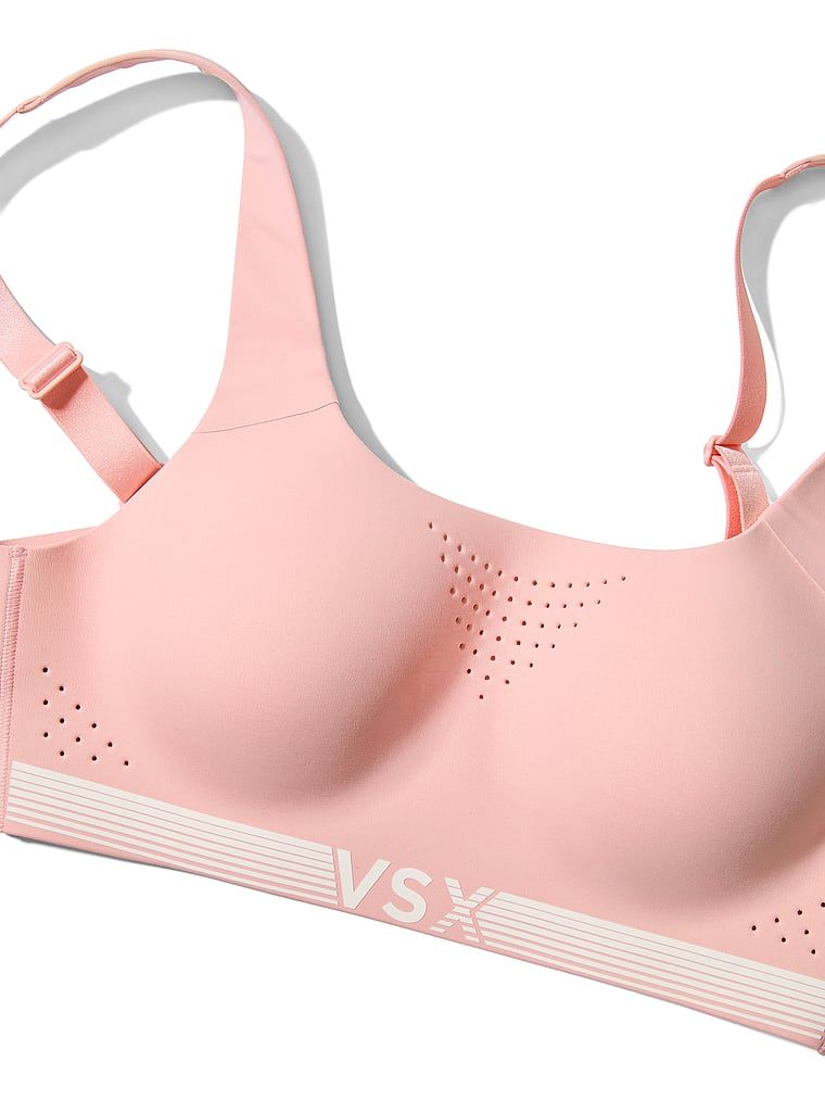 VSX Featherweight Max Maximum Support sportovní podprsenka. Produkt je růžové barvy a pochází z kolekce VSX.