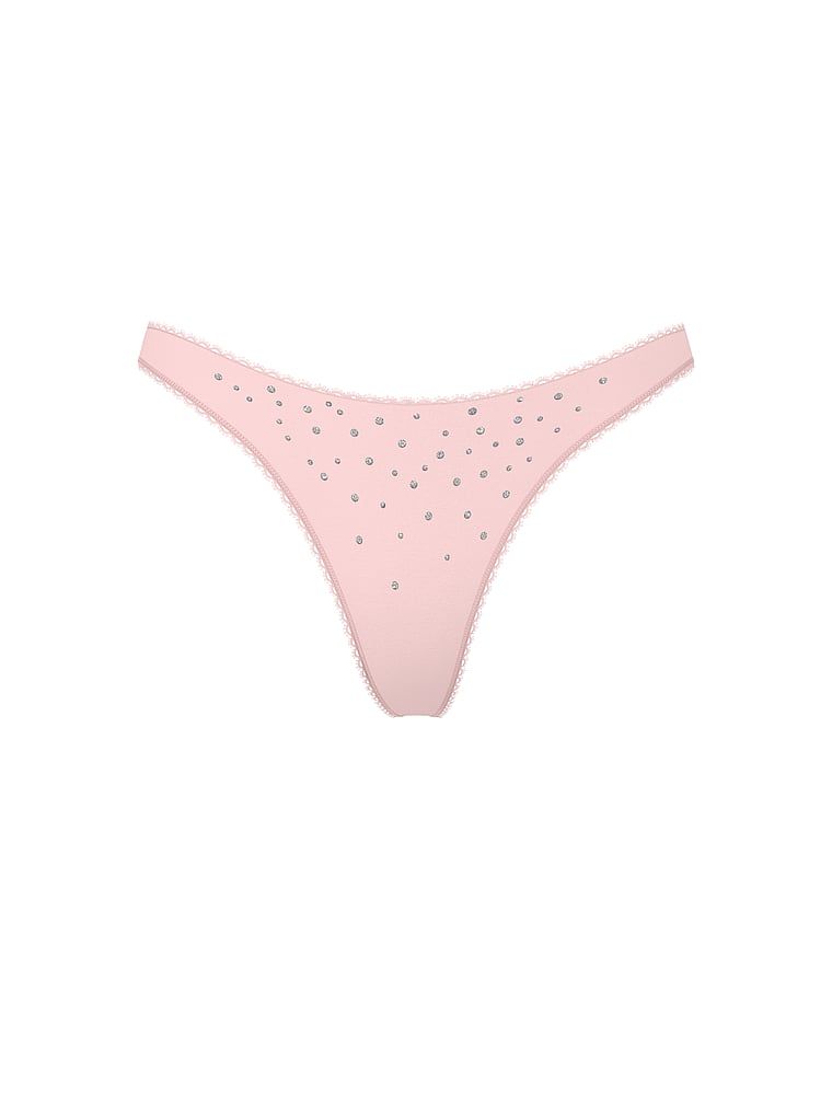 Bavlněná tanga s třpytivými flitry. Produkt má růžovou barvu a pochází z kolekce Victoria's Secret.