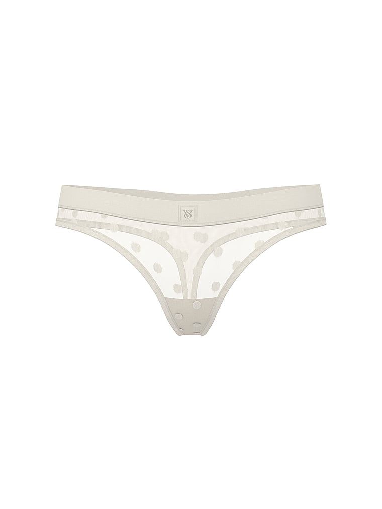 Průhledná tanga ze síťoviny Heritage Shimmer. Výrobek má zlatou barvu a pochází z kolekce Cotton.
