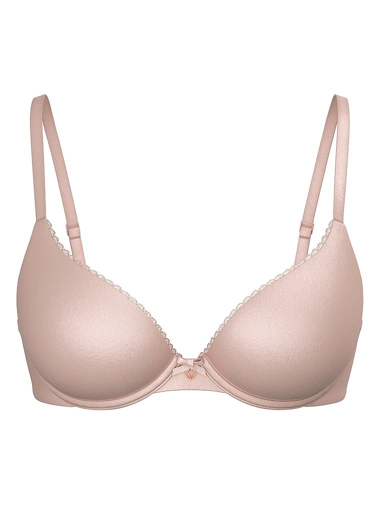 Mírně vycpaná podprsenka s pevně vystavěnými košíčky. Produkt je béžové barvy a pochází z kolekce Body by Victoria.