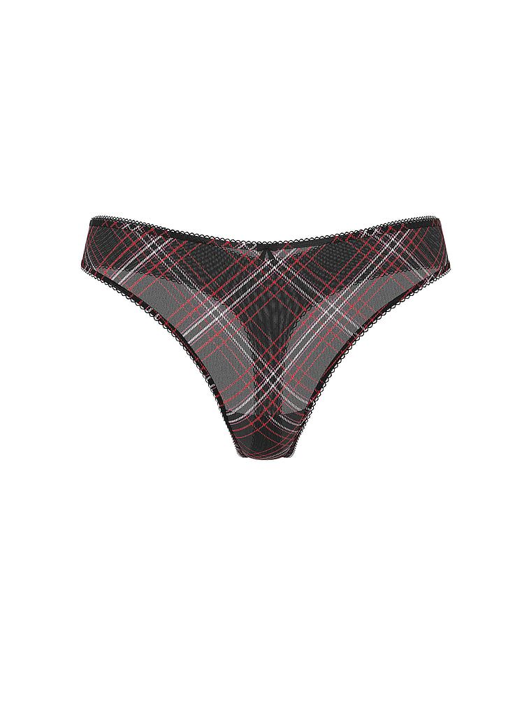 Lesklá tanga s třpytivou síťovinou. Produkt je vzorovaný a pochází z kolekce Lacie.