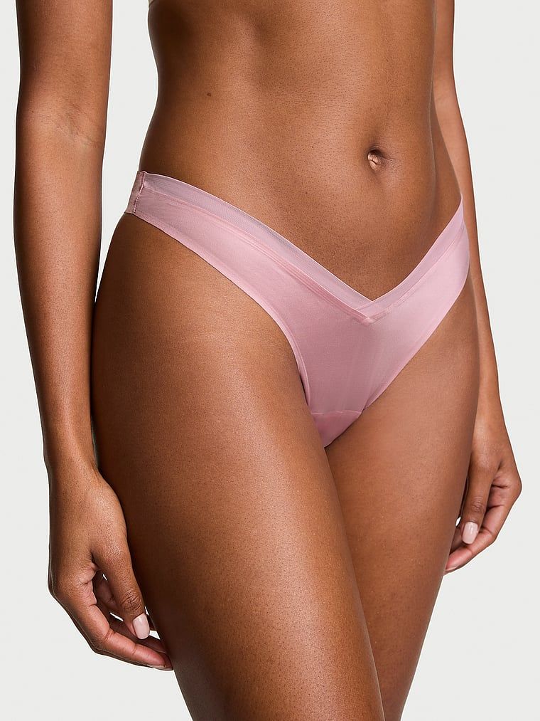 Tanga s ramínky na zádech Sheer Reveal. Produkt je růžové barvy a pochází z kolekce Very Sexy.