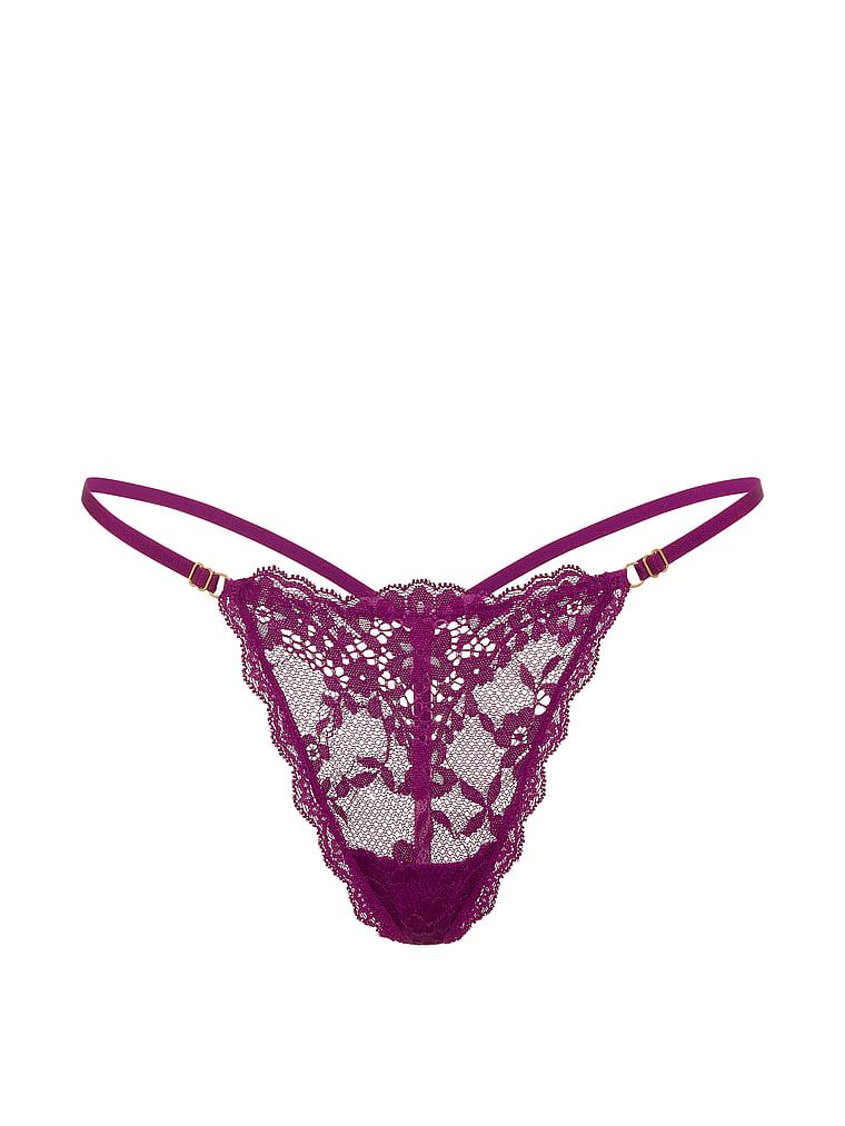 Krajkové tanga s nastavitelnými krajkovými V-stringy. Produkt je fialové barvy a pochází z kolekce Dream Angels.